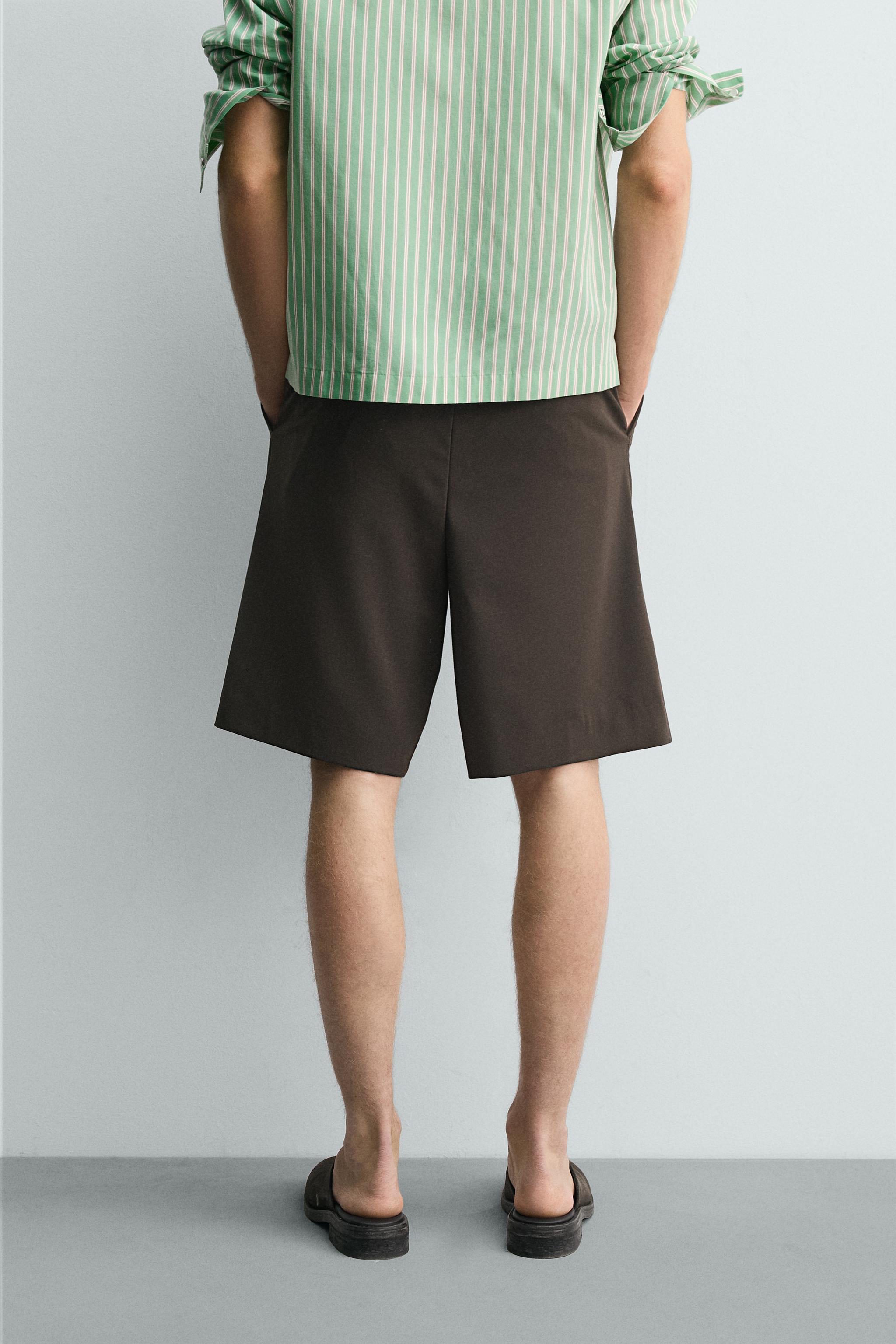 RELAXED FIT PLEATED SHORTS